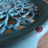 Dessous de plat ancien en fonte émaillé