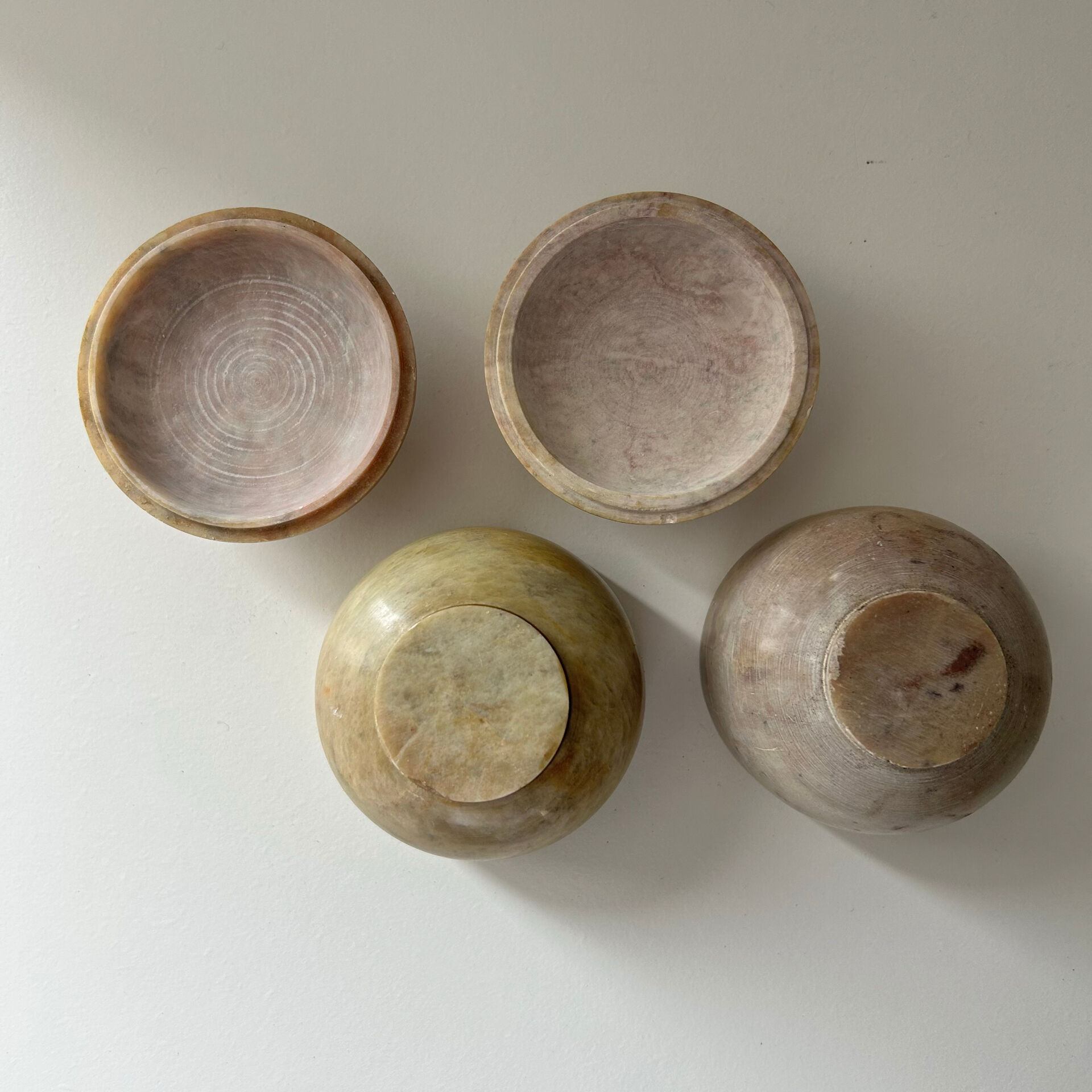 2 small stone urns