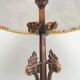 Rock-style table lamp with its vintage bird pattern shade