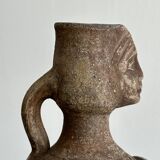 Decorative vase in raw terracotta