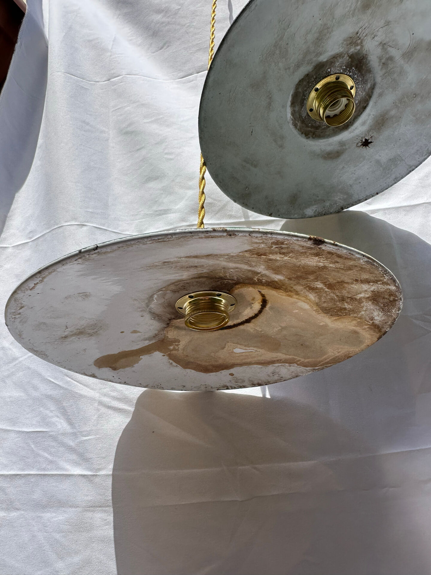 Old suspension pair in green and white enamelled sheet metal.
