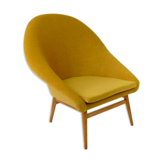 Fauteuil coque jaune vintage