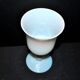 Ancient opaline white glass goblet with a soap bubble effect.