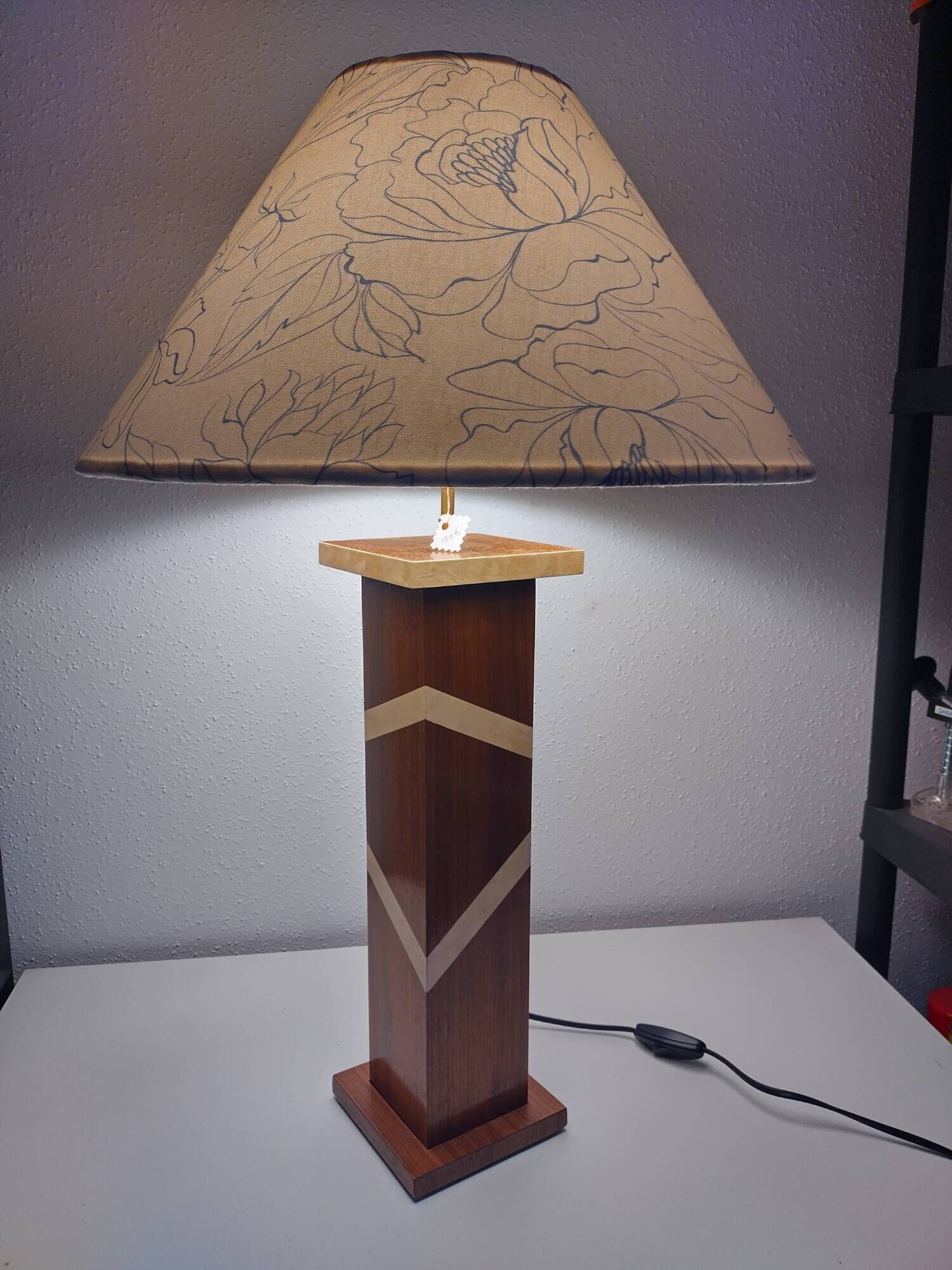 Accent lamp in American walnut veneer.