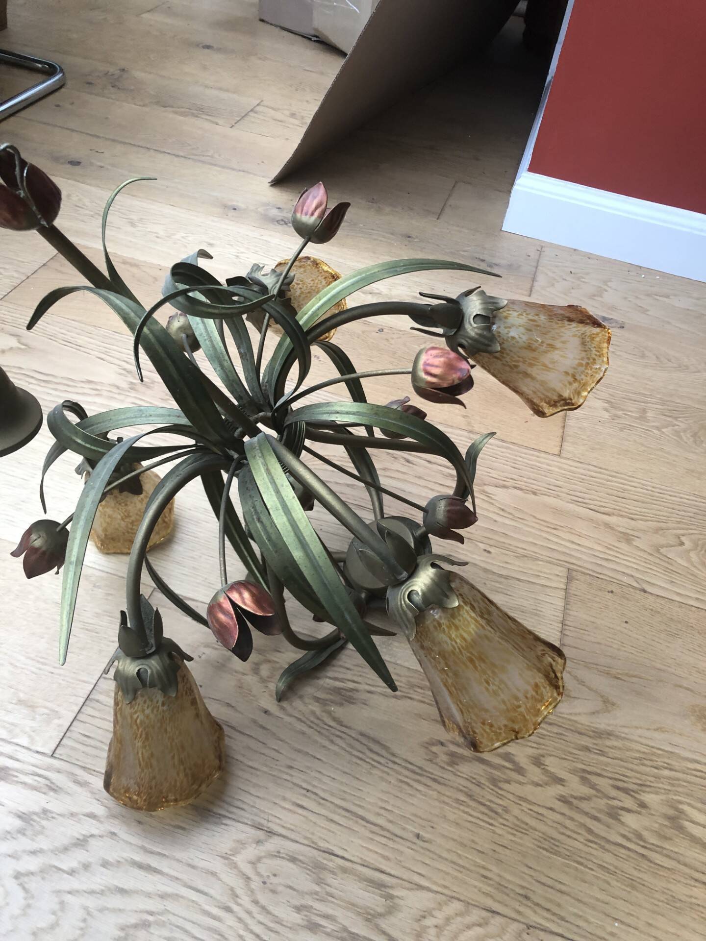 Antique Art Deco metal chandelier with a tinted glass shade.