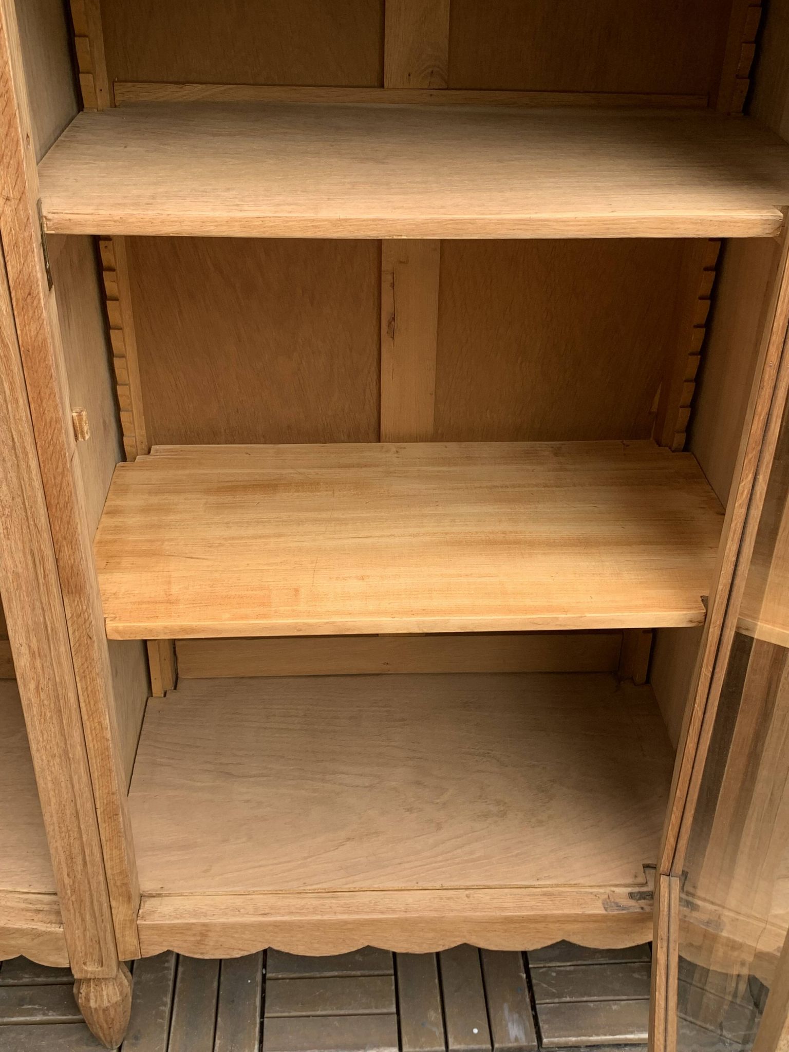 Asymmetrical Art Deco glass-fronted Parisian wardrobe in raw oak, 1930.
