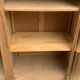 Asymmetrical Art Deco glass-fronted Parisian wardrobe in raw oak, 1930.