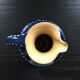 Midnight blue pitcher décor white polka dots