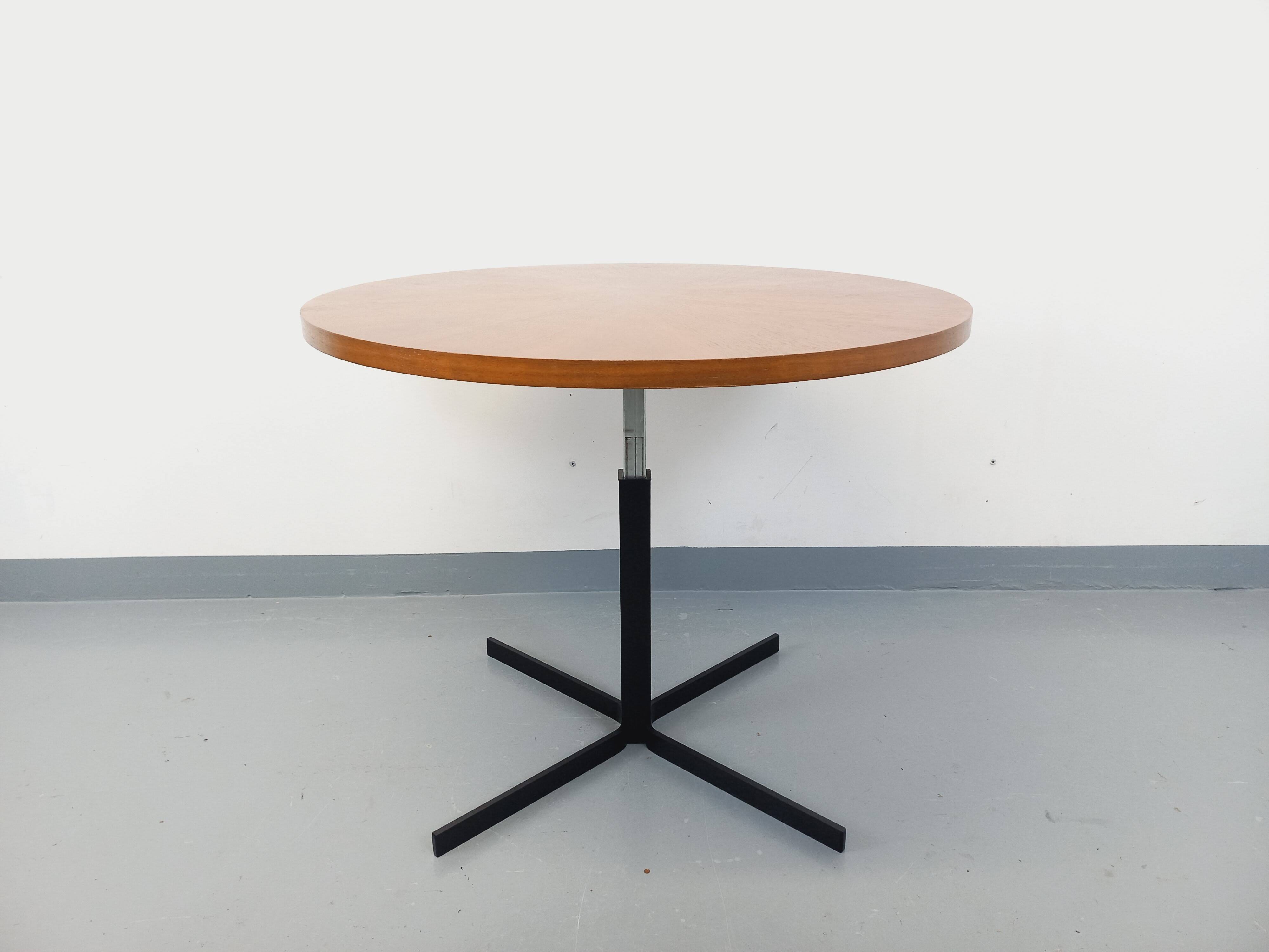 Large round coffee table in vintage Scandinavian style, modular into a table.