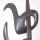 Antonine de Saint Pierre. Curved metal sculpture. Contemporary work.