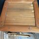 Trio of vintage rattan plant holders in the 60s