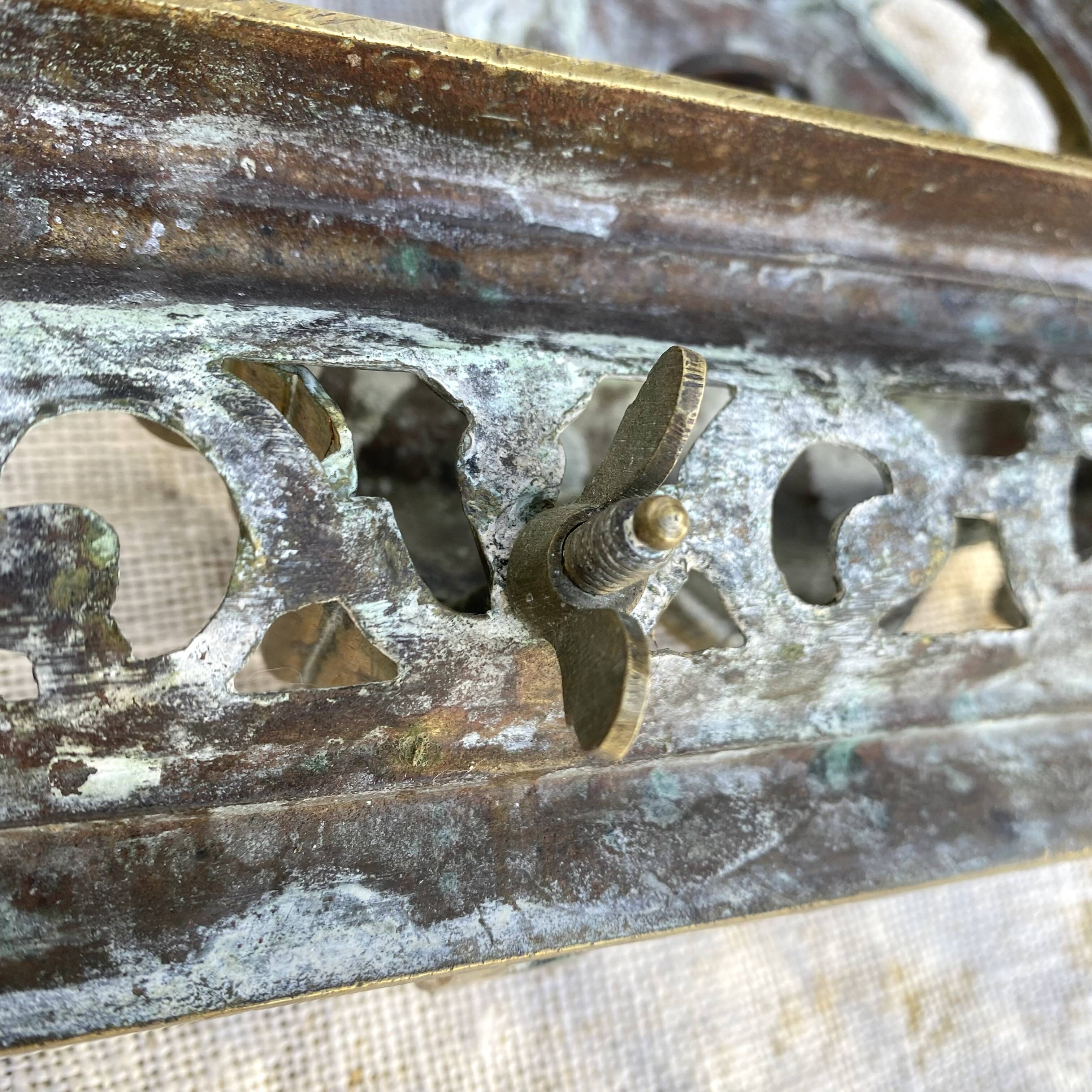 Antique brass fireplace set, bar and andirons, Napoleon I style.