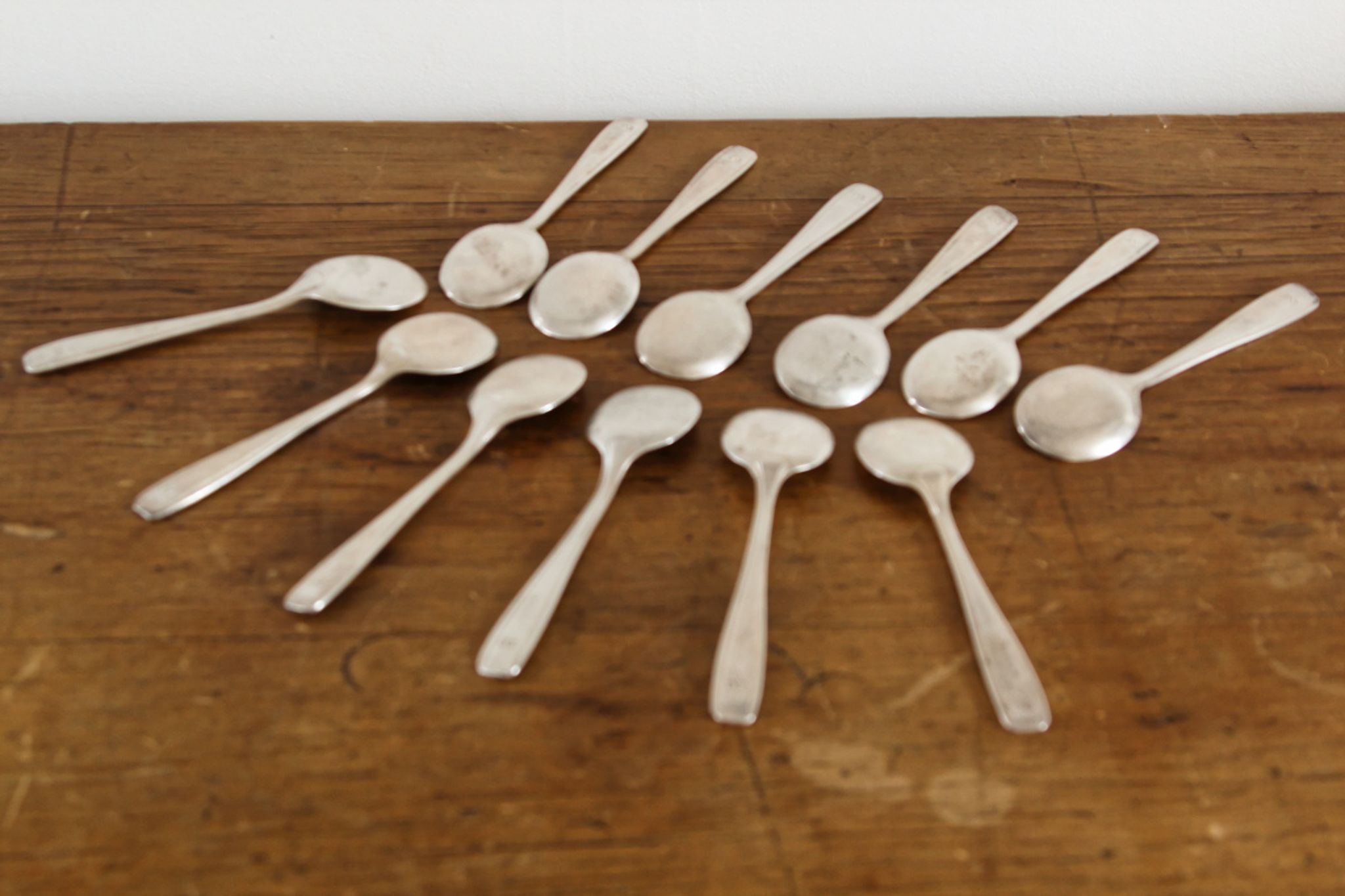 12 silver metal ice spoons, Ercuis
