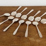 12 silver metal ice spoons, Ercuis