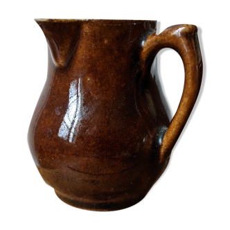 Small brown ceramic milk pot