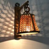 Pair of rattan and cane lantern wall lights. 1950s-60s