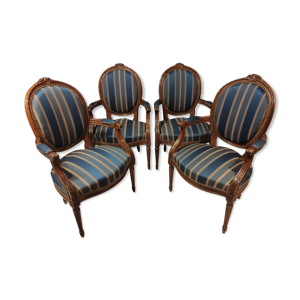 suite de quatre fauteuils style Louis XVl