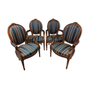 Suite de quatre fauteuils style louis XVl