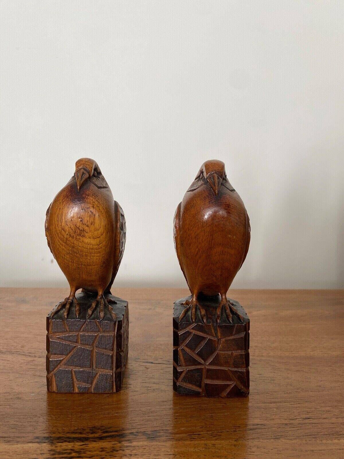 Pair of Art Deco bookend birds in carved wood cubizing 1930
