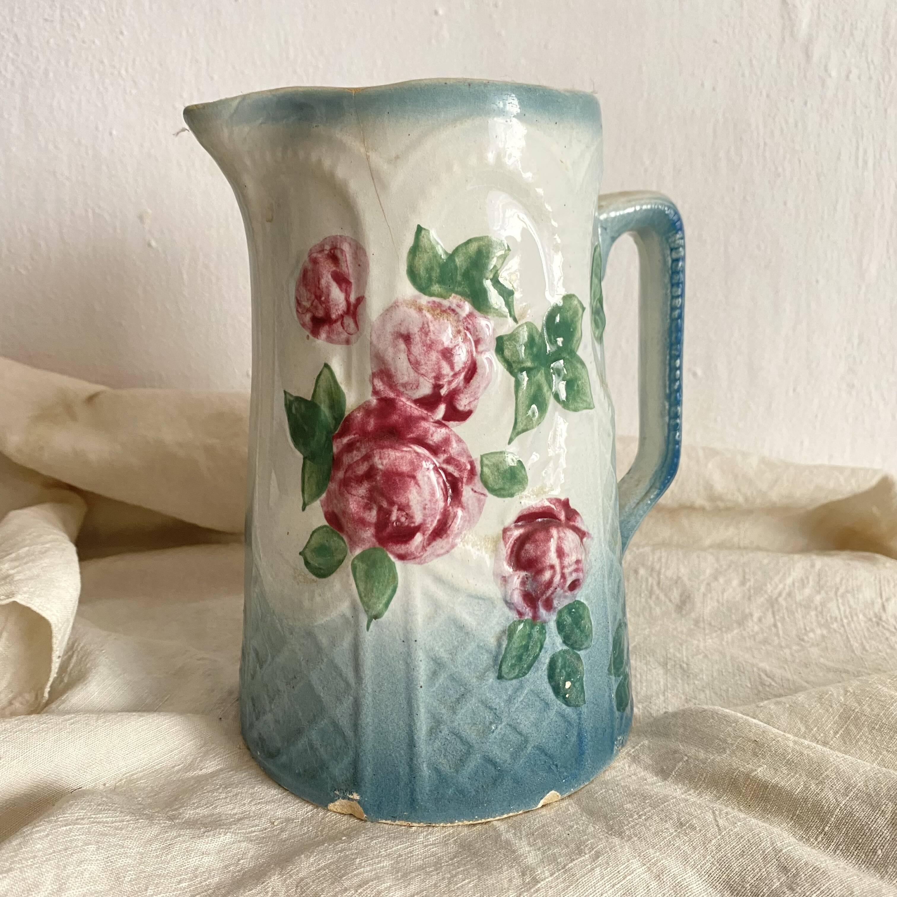 Art Nouveau slip pitcher with roses