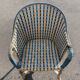 Old vintage woven and rattan wicker armchair 1930