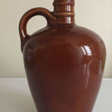 Bottle of Calvados labeled in sandstone