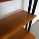 Armoire design en teck Musterring avec pieds noirs