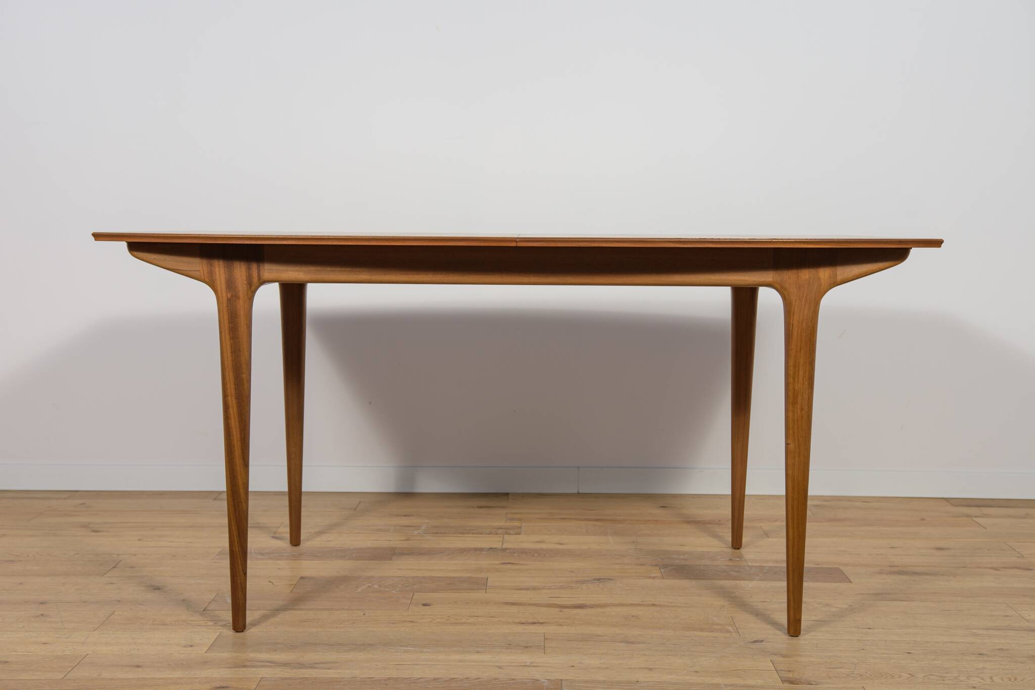 Mid-century teak extending dining table from McIntosh, UK.