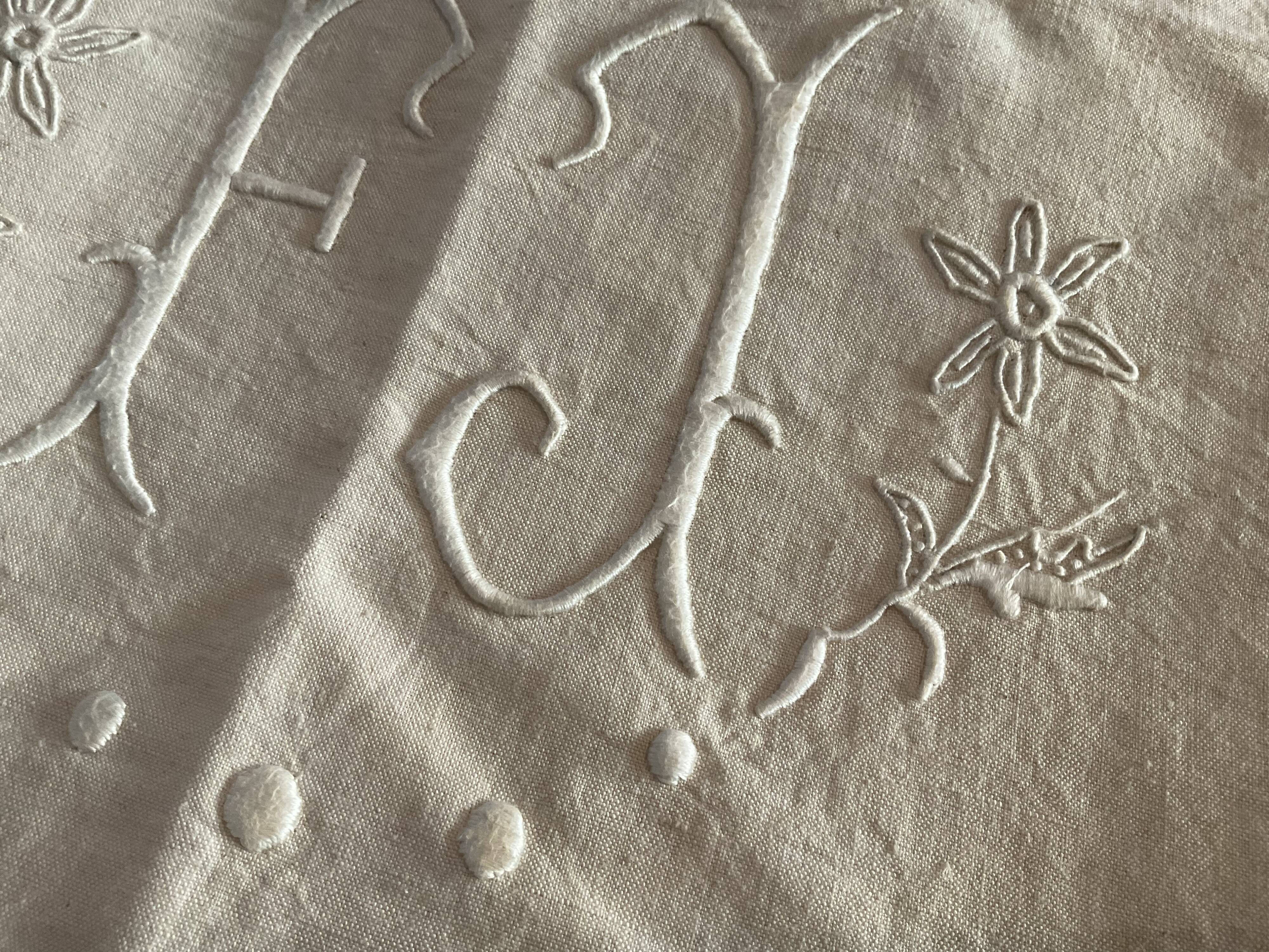Old embroidered sheet, monogram F J