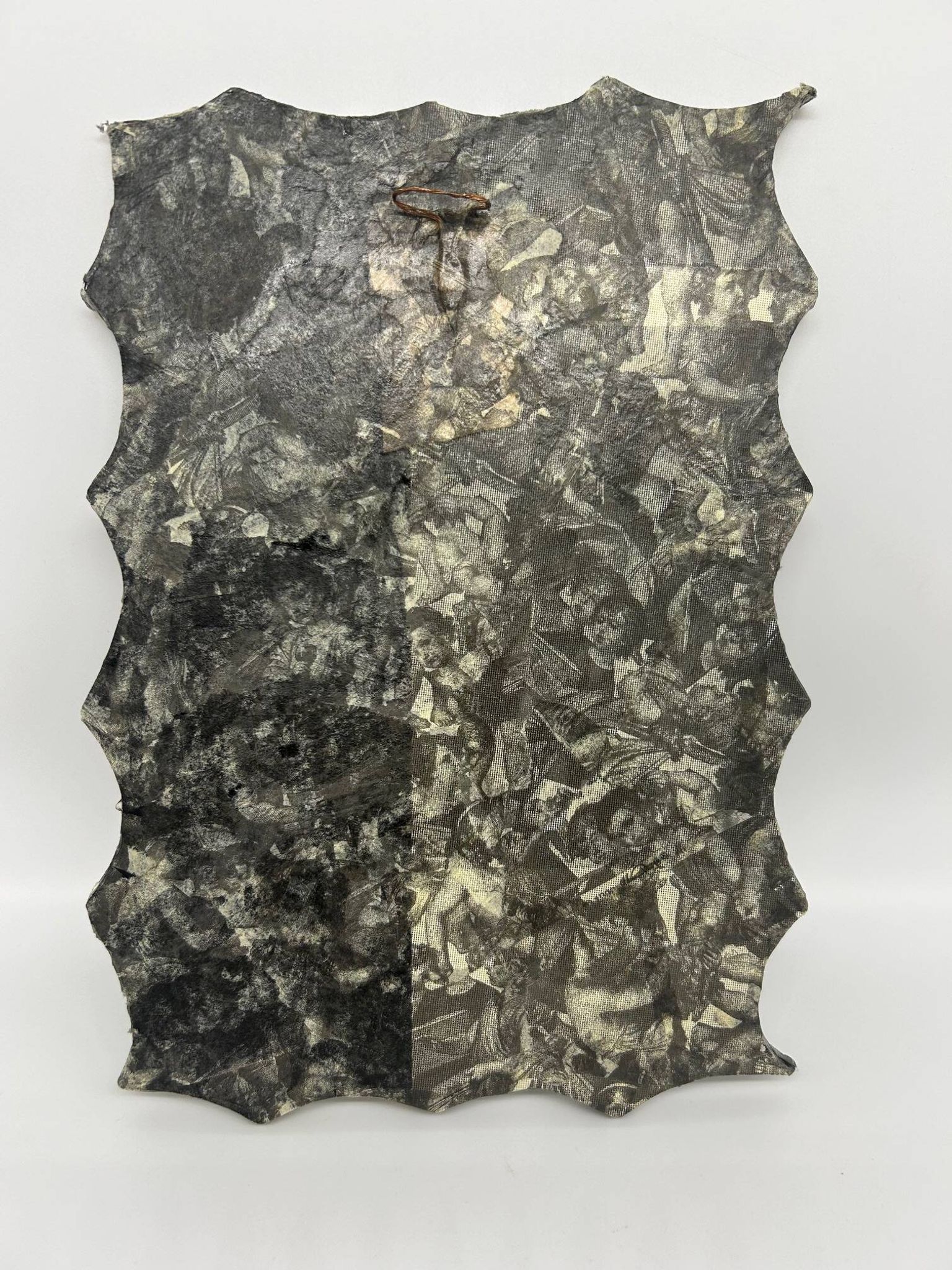 Free-form mirror decorated with cherubs.