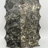 Free-form mirror decorated with cherubs