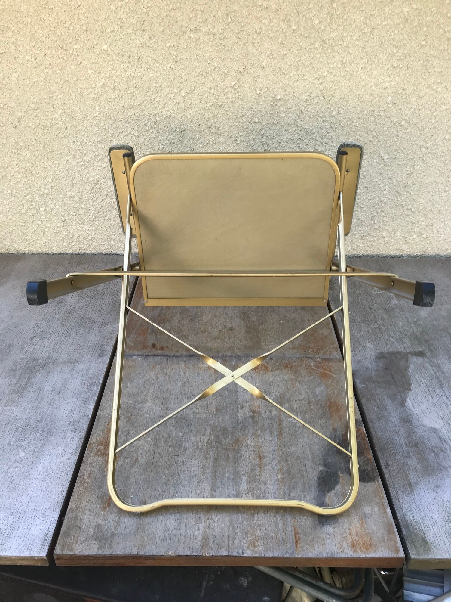Former Lafuma gold metal folding chair