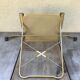 Former Lafuma gold metal folding chair
