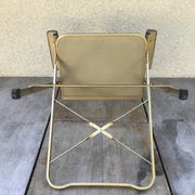 Former Lafuma gold metal folding chair