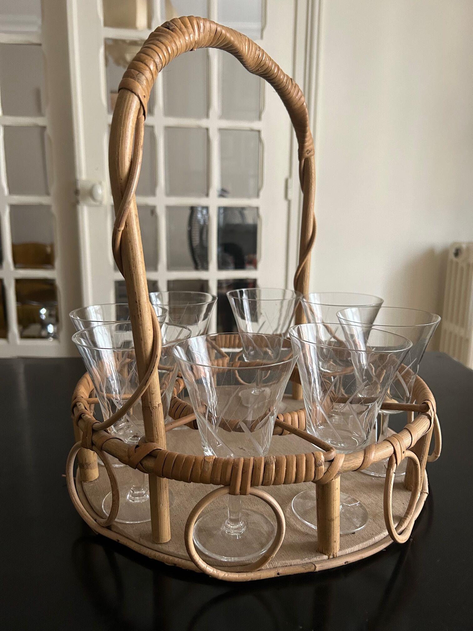 Wicker basket and 8 antique glasses