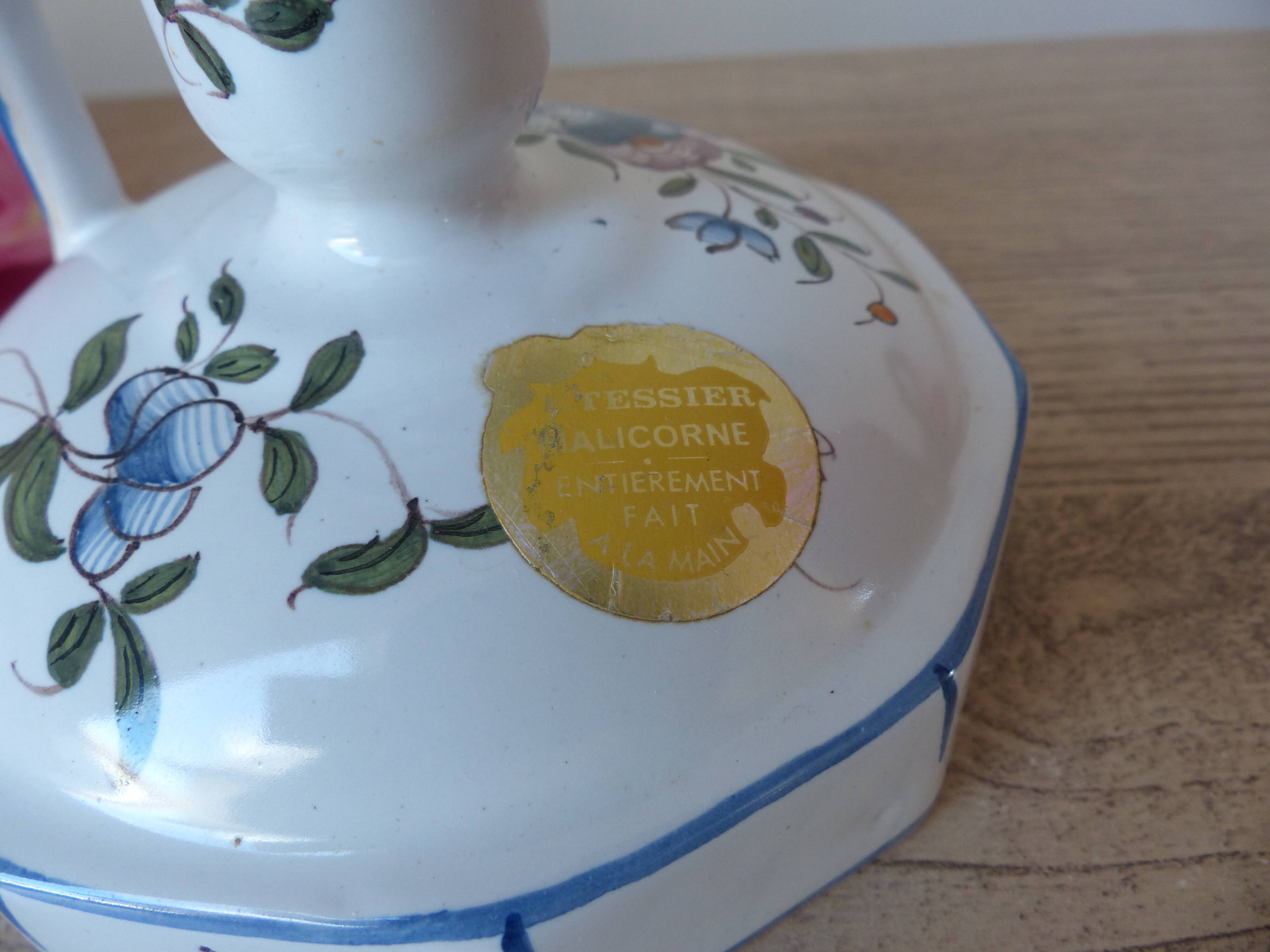 Malicorne earthenware candle holder by Emile Tessier with floral decoration