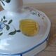 Malicorne earthenware candle holder by Emile Tessier with floral decoration