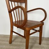 Curved wooden child's armchair - early 20th century