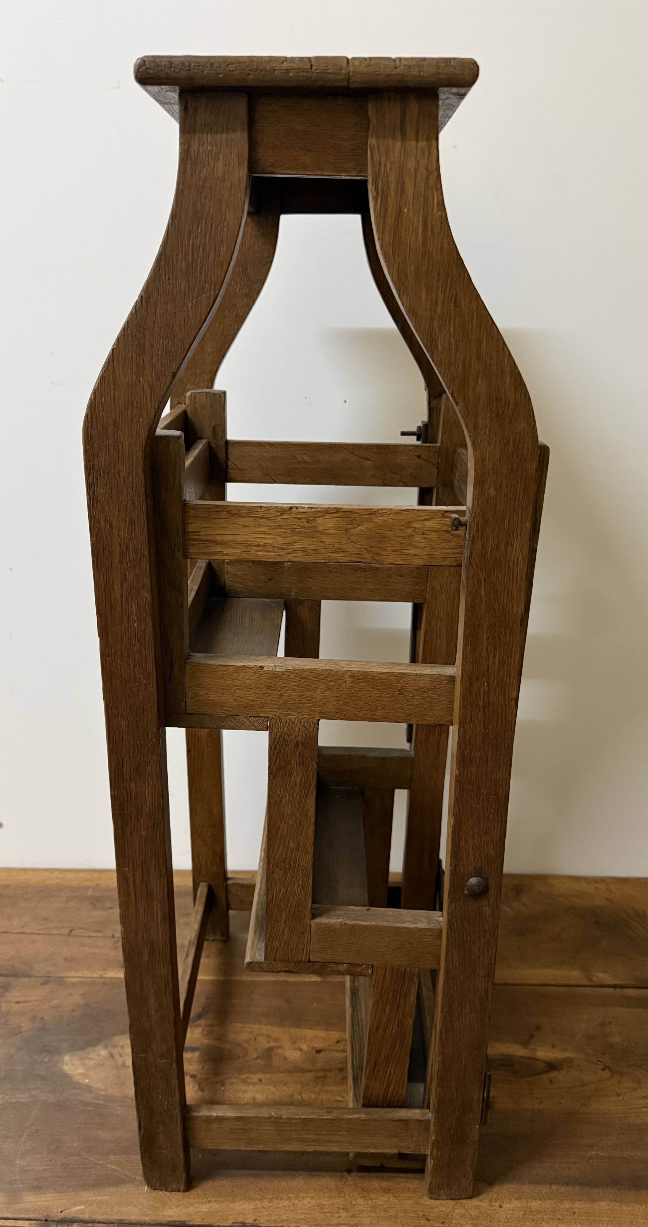 Stool transforming into a step ladder.