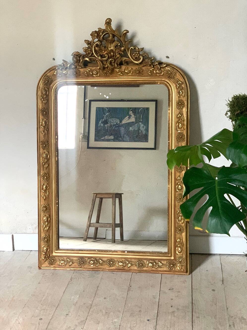 Gilded fireplace mirror with pediment