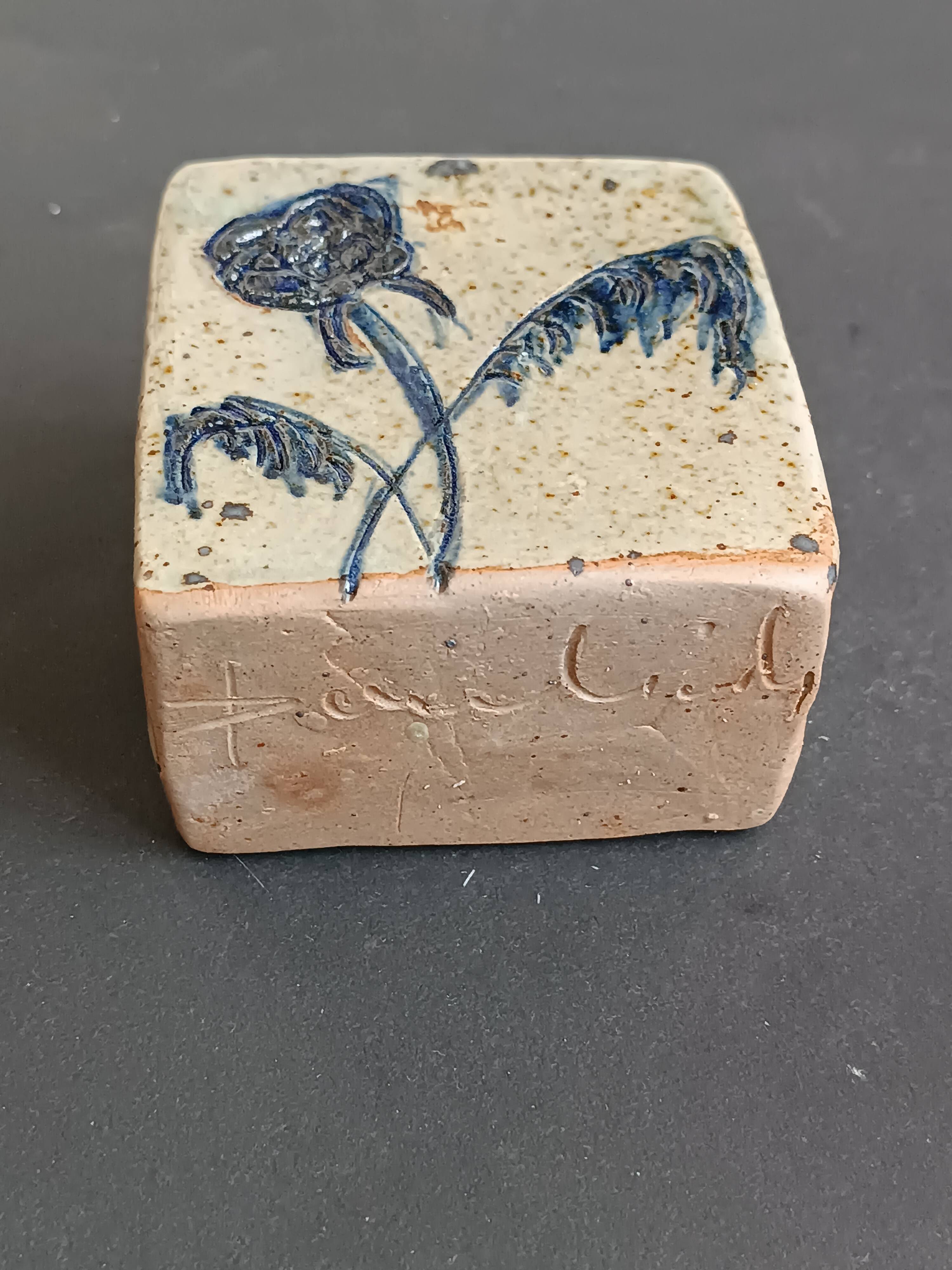 Pyrite stone vase with blue thistle decoration by Suzanne Dauliach, vintage.