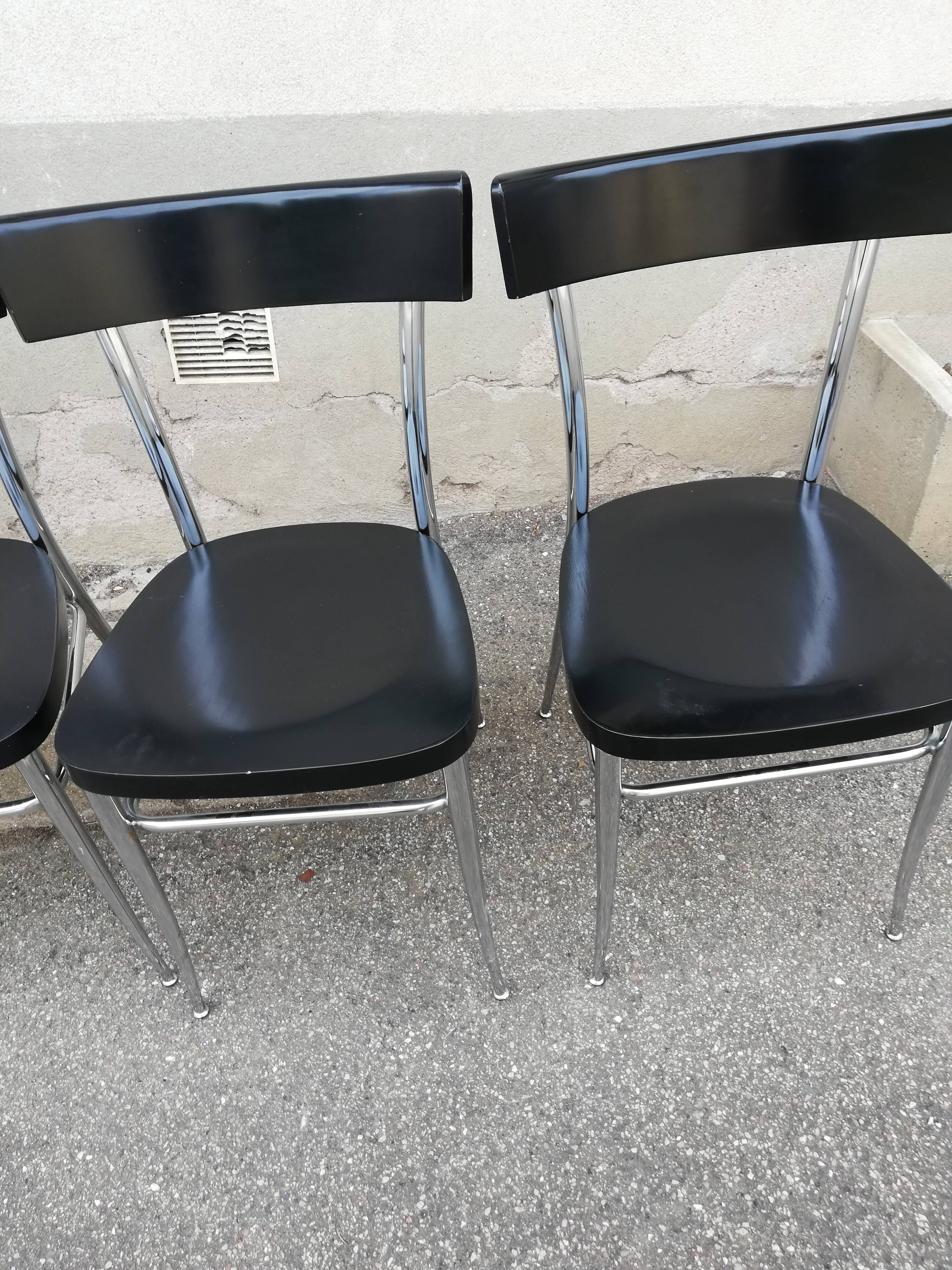 Set of 4 vintage chairs chrome and black wood