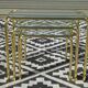 Nested table in gold metal and glass