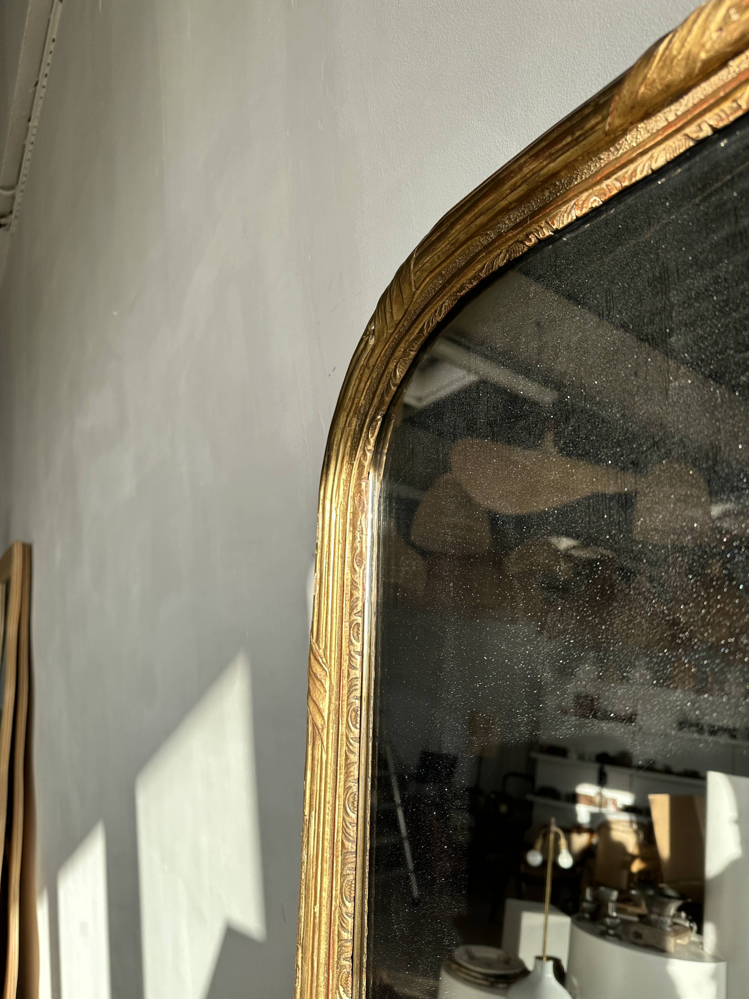 Large gilded mirror 19th century rounded corners mercury glass Louis XVI style