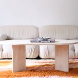 Oval travertine coffee table