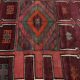 Hand-knotted rug of 308x210cm in oriental style with mainly red colours