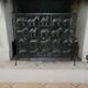 Black metal firewall decorated with animals