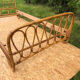 Rattan bed.