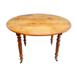 Table ronde à roulettes achetée chez un antiquaire