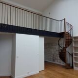 Old bistro staircase from the early 20th century with railing